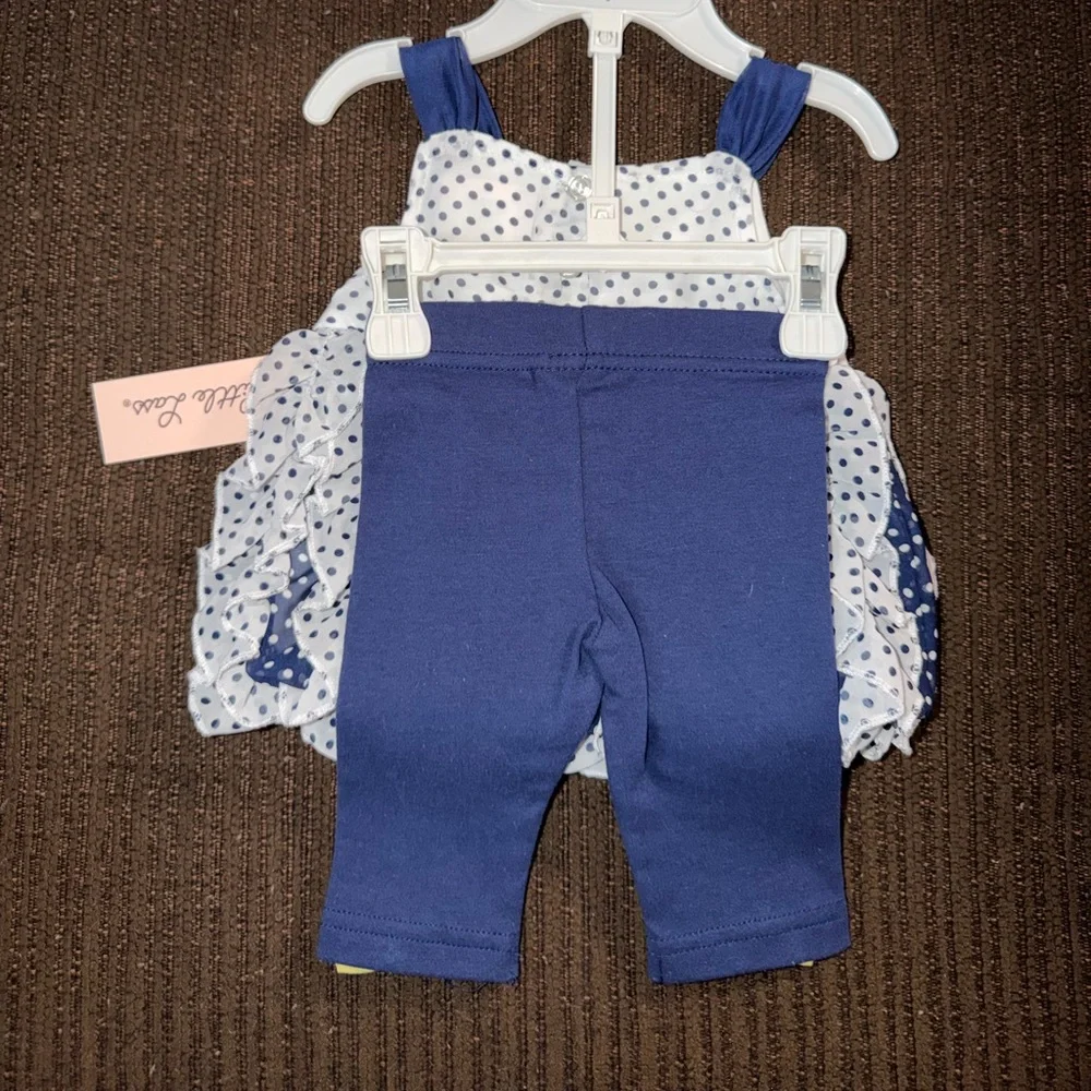 Little Lass Navy and White Polka Dot Bib with Yellow Bow